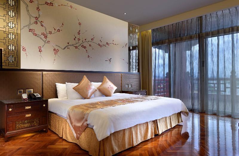 The Grand Hotel Taipé Exterior foto A bedroom at the hotel